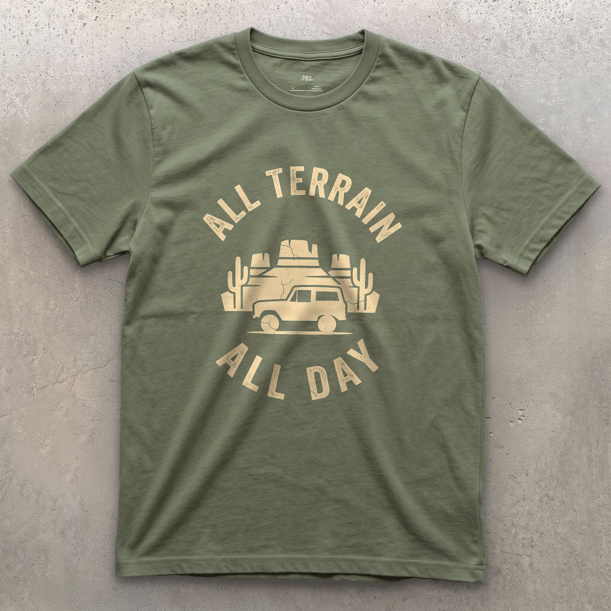 All Terrain All Day, Wagon Among the Mesas design on a Military Green Gildan Softstyle t-shirt