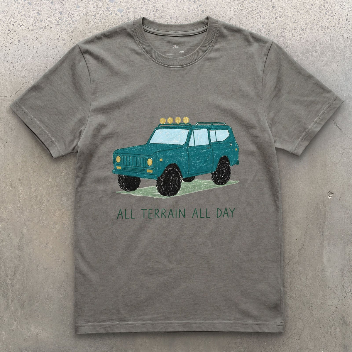 All Terrain All Day, Teal Wagon design on a Charcoal Gildan Softstyle t-shirt