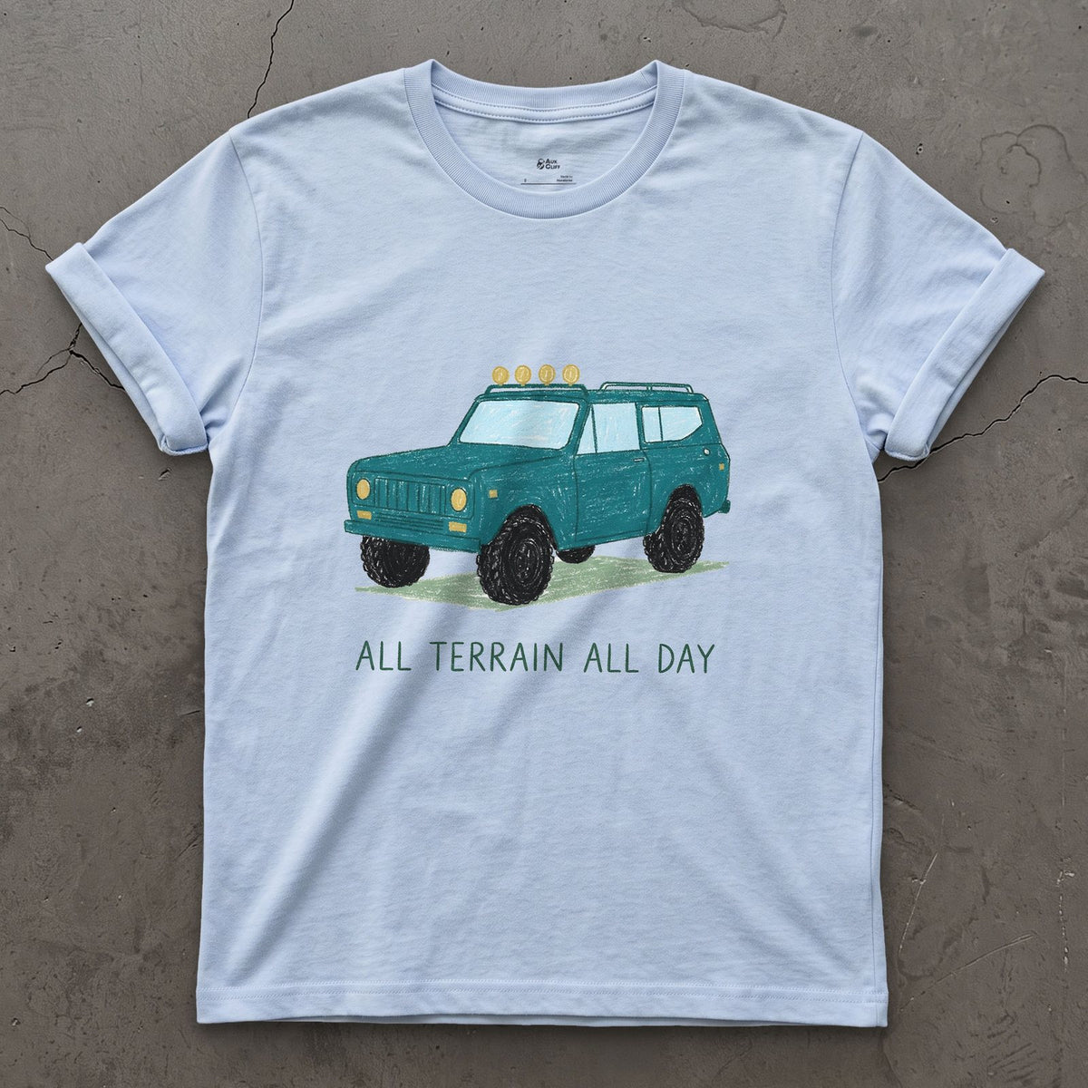 All Terrain All Day, Teal Wagon design on a Light Blue Gildan Softstyle t-shirt