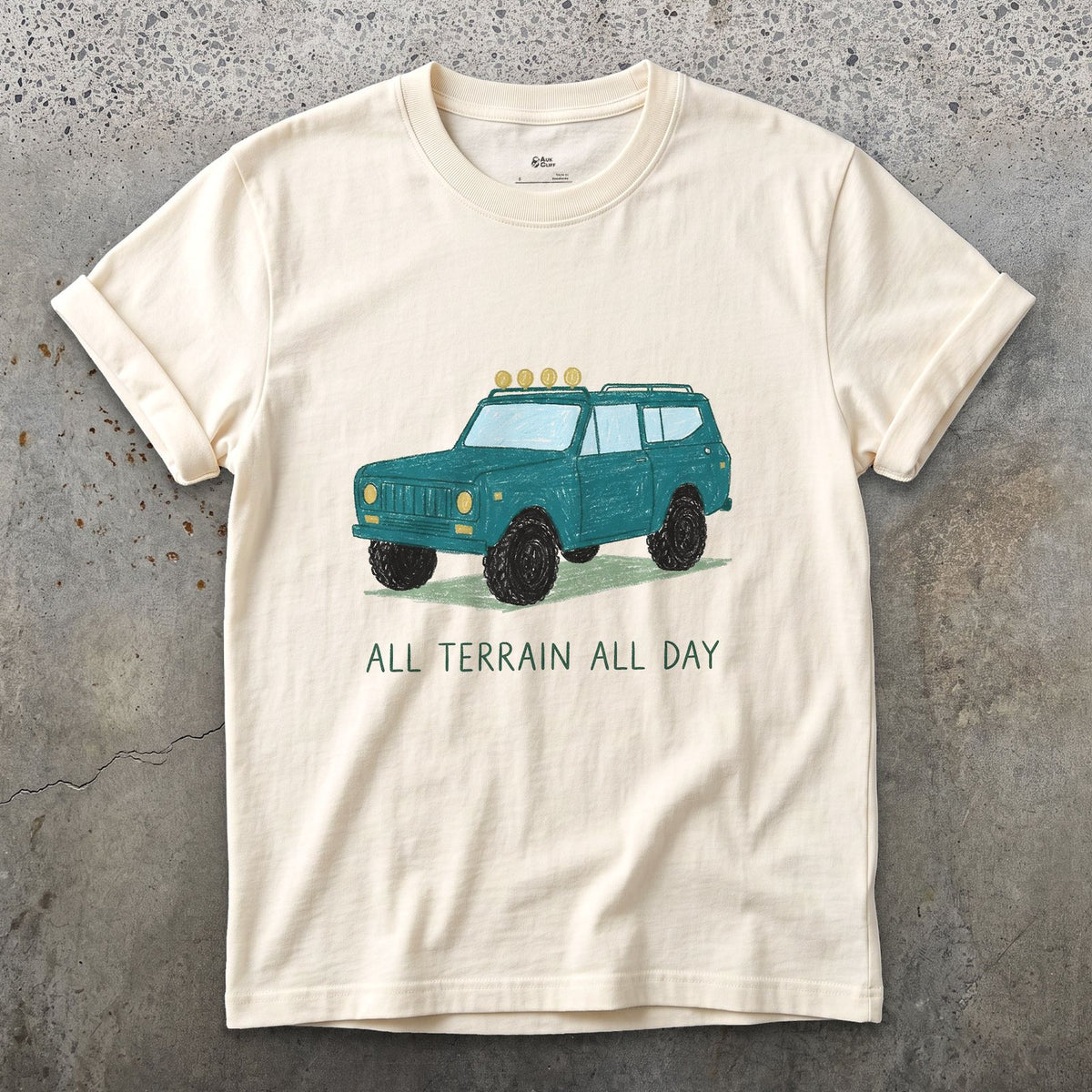 All Terrain All Day, Teal Wagon design on a Natural Gildan Softstyle t-shirt