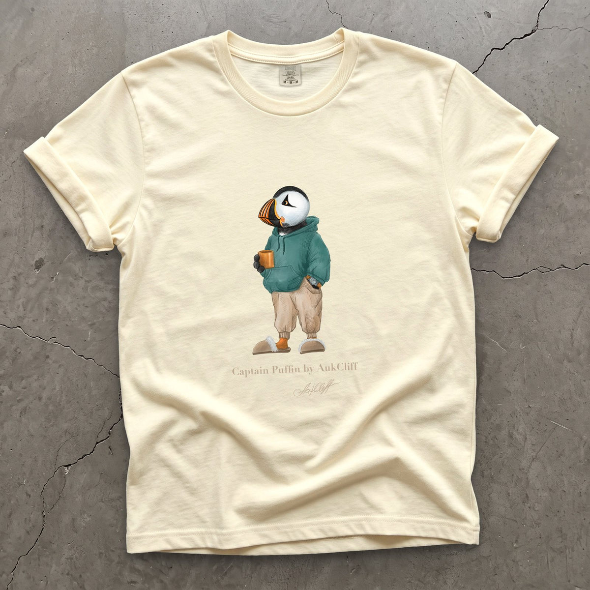 Captain Puffin Trail Après on a Ivory Comfort Colors t-shirt