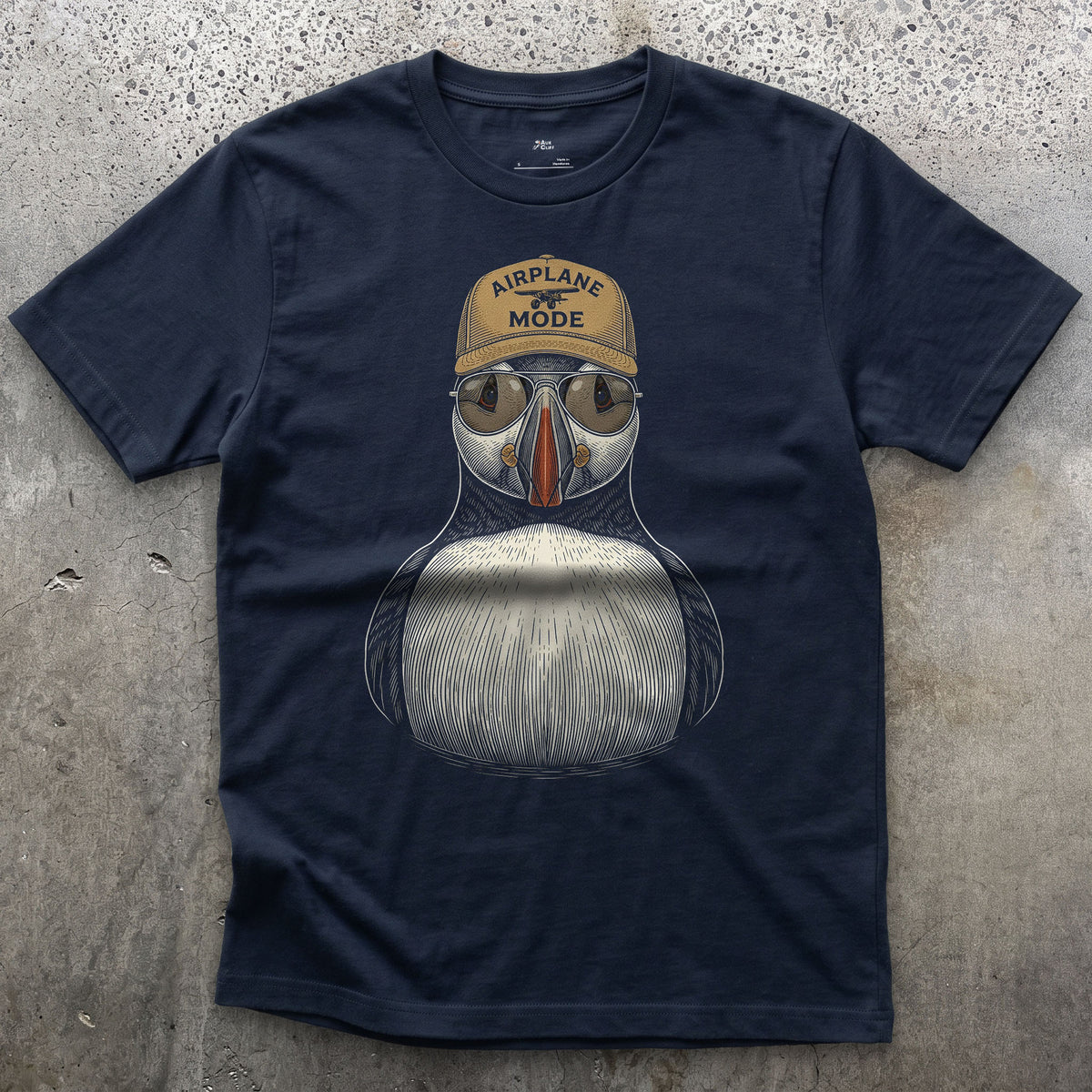 Airplane Mode, Atlantic Puffin in Aviators design on a Navy Gildan Softstyle t-shirt