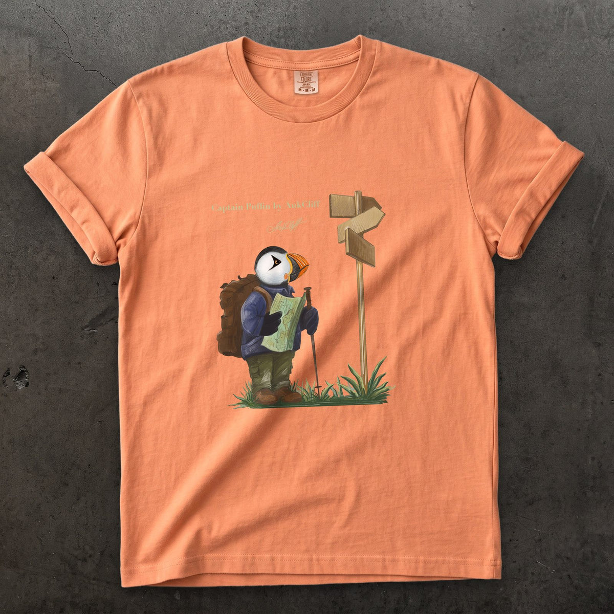 Captain Puffin Hiker on a Terracotta Comfort Colors t-shirt