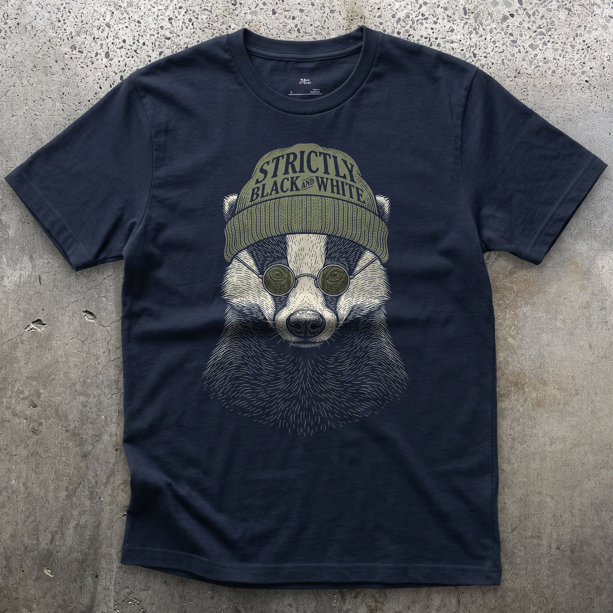Strictly Black and White, Badger in the Woods design on a Navy Gildan Softstyle t-shirt