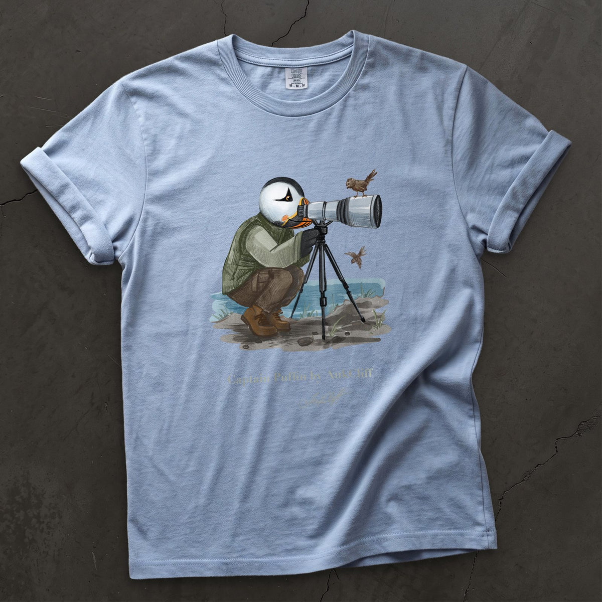 Captain Puffin Bird Photographer on a Washed Denim Comfort Colors t-shirt