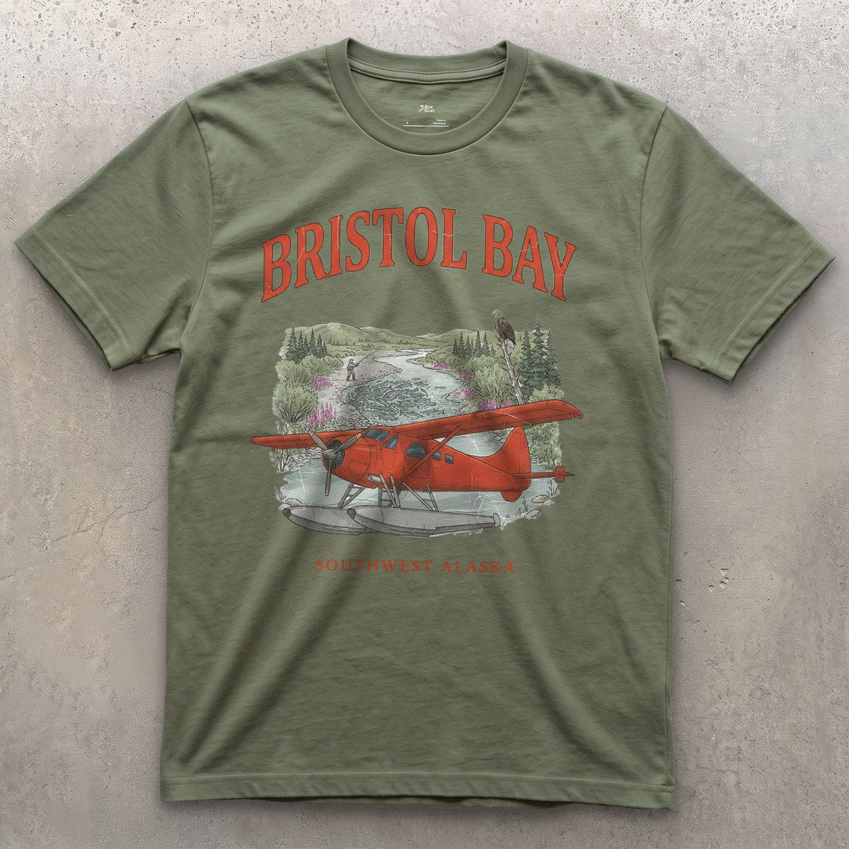 Bristol Bay Bush Plane design on a Military Green Gildan Softstyle t-shirt