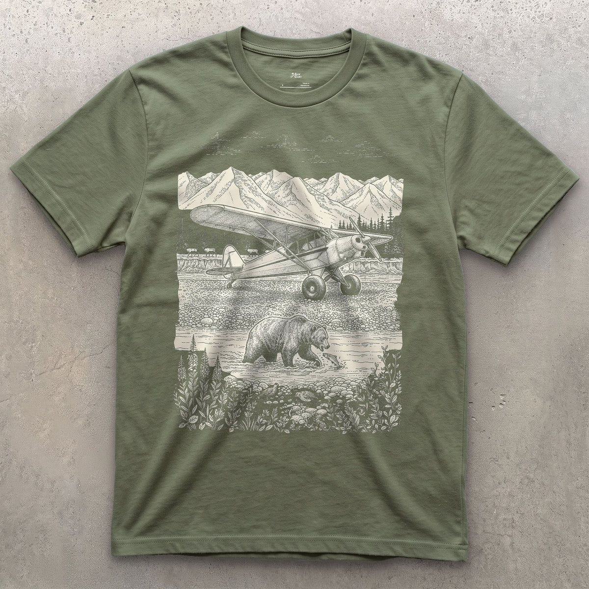 Bush Plane on the Gravel Bar design on a Military Green Gildan Softstyle t-shirt