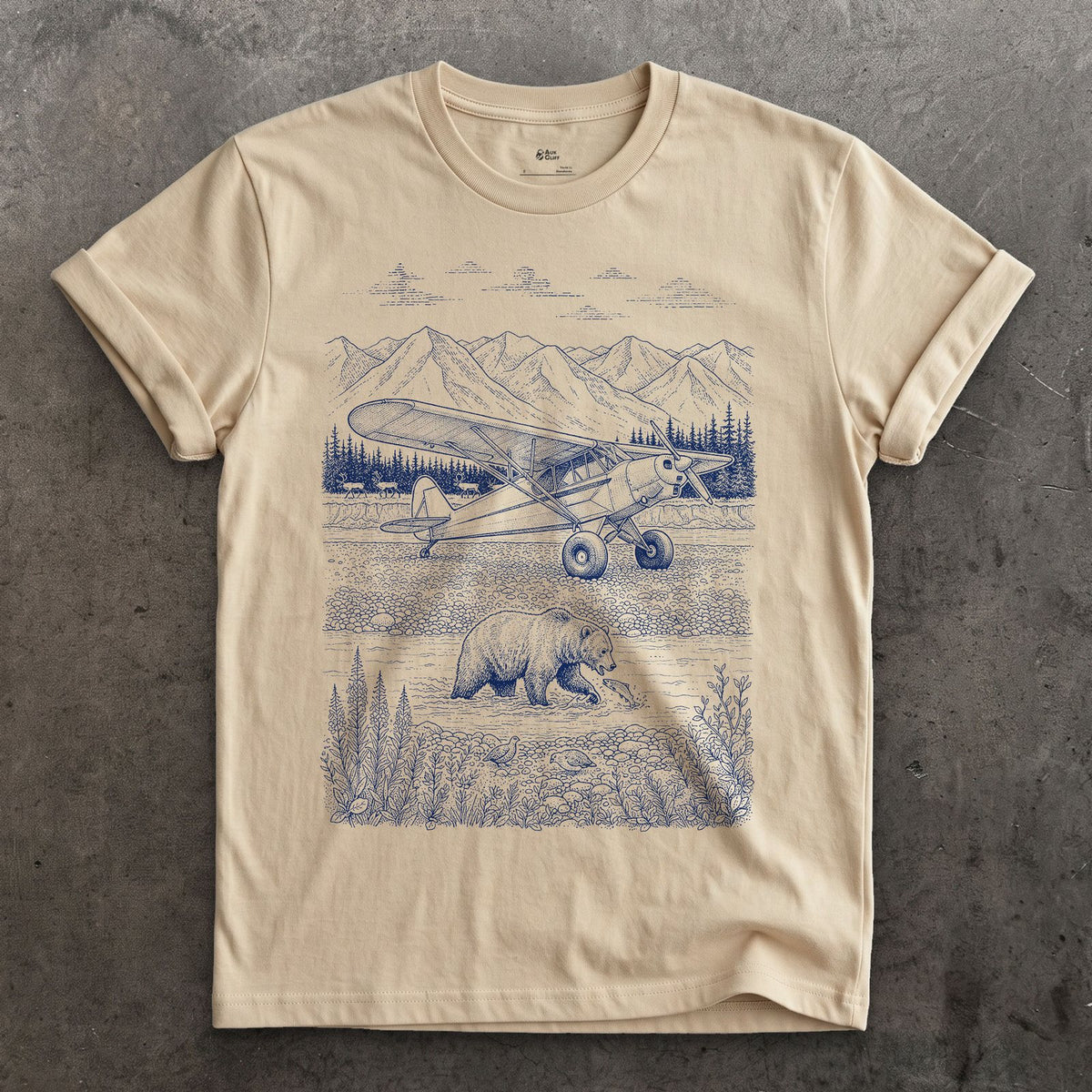 Bush Plane on the Gravel Bar design on a Sand Gildan Softstyle t-shirt