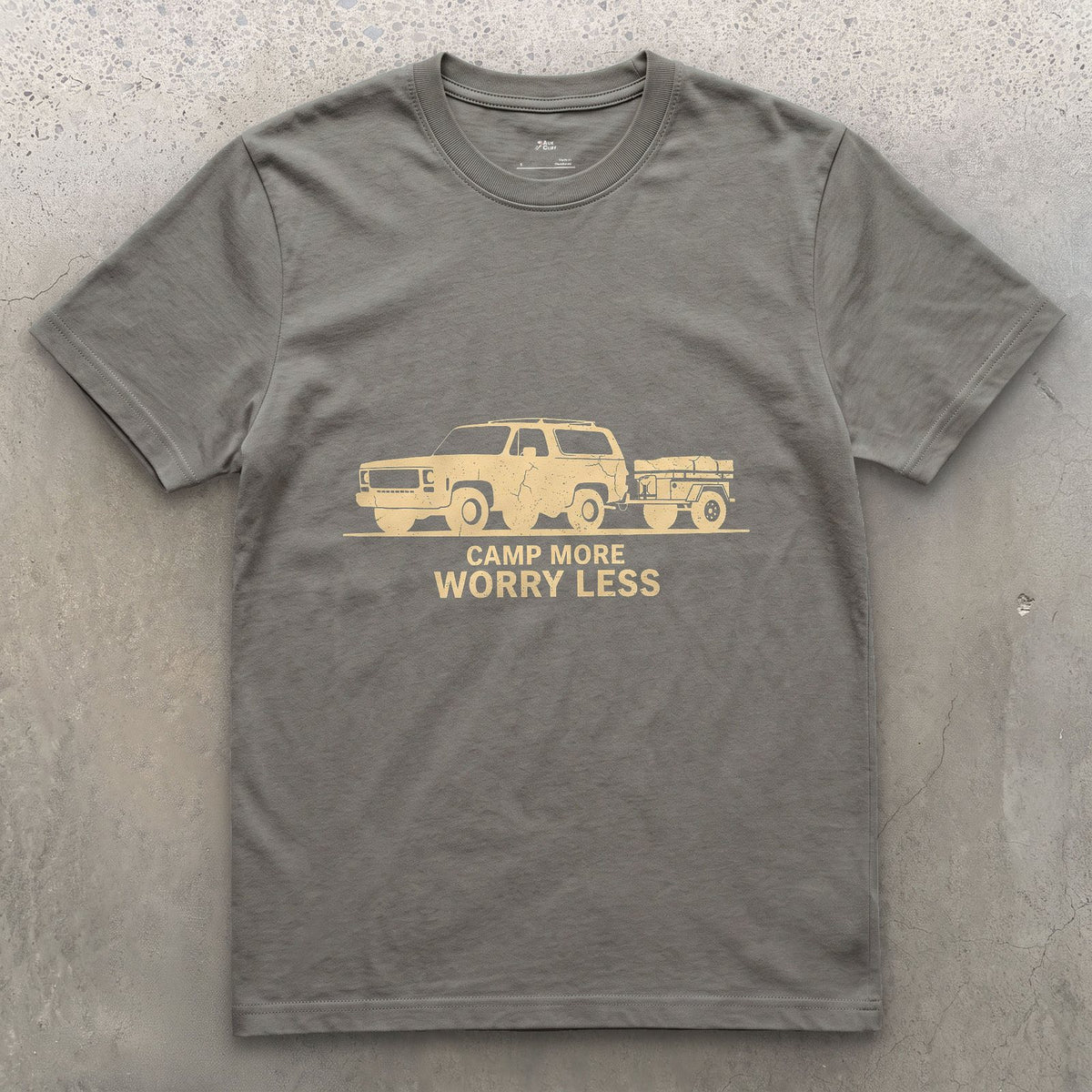 Camp More Worry Less Towing the Cream Trailer design on a Charcoal Gildan Softstyle t-shirt