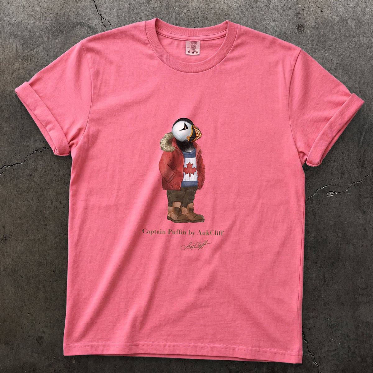 Captain Puffin Canada Trailkeeper on a Crunchberry Comfort Colors t-shirt