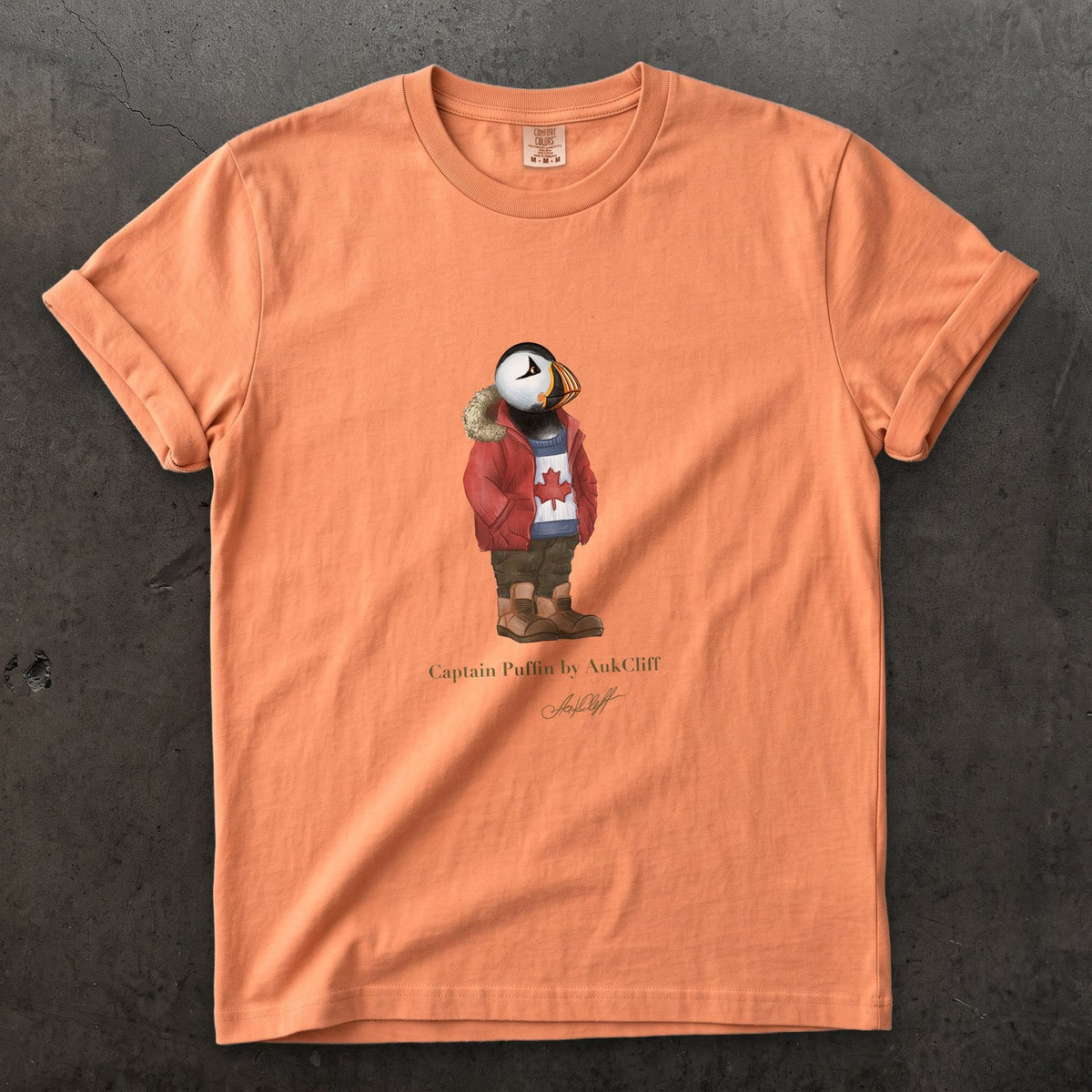 Captain Puffin Canada Trailkeeper on a Terracotta Comfort Colors t-shirt