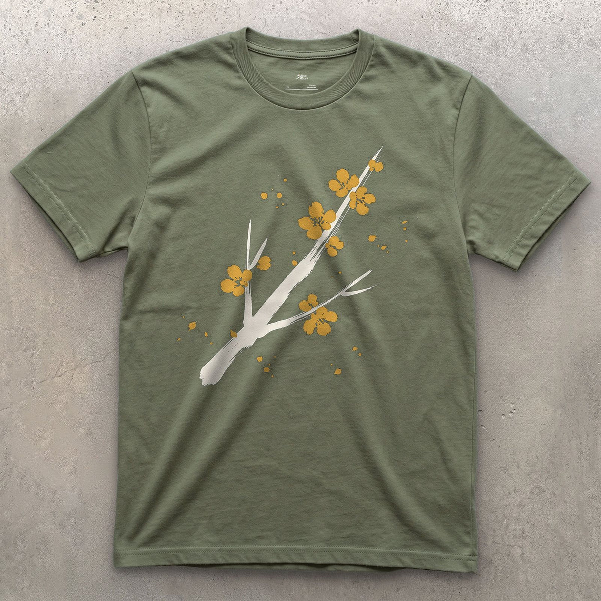 Cherry Blossom Branch design on a Military Green Gildan Softstyle t-shirt