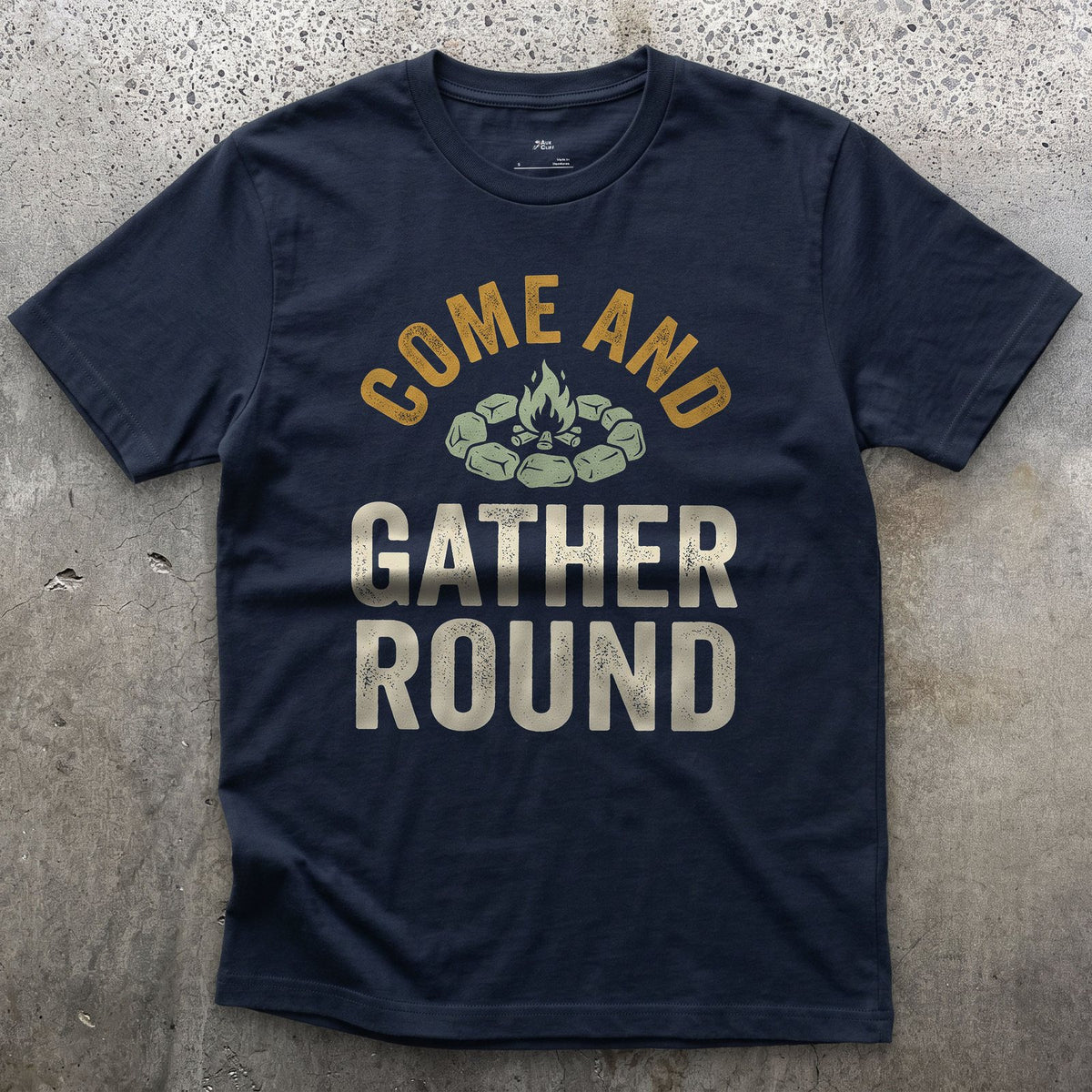 Come and Gather Round, Stone Ring Badge design on a Navy Gildan Softstyle t-shirt