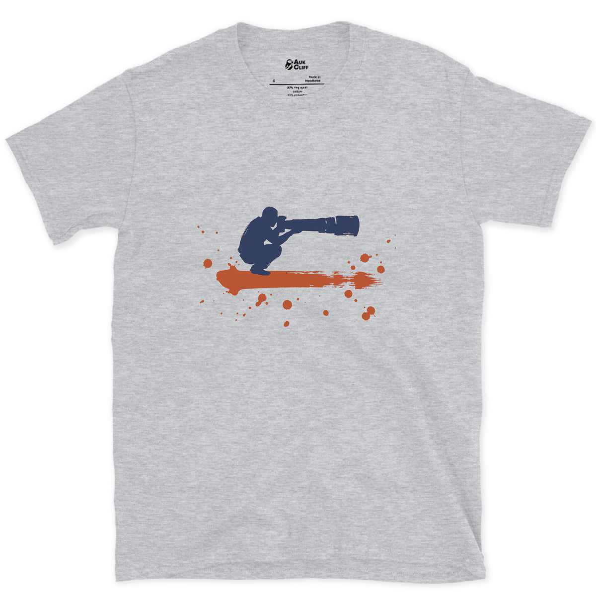 Crouched Behind the Lens design on a Sport Grey Gildan Softstyle t-shirt