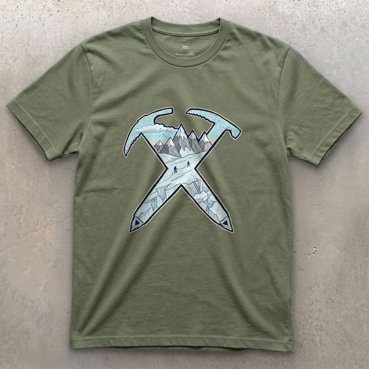Dawn on the Glacier, Crossed Ice Axes design on a Military Green Gildan Softstyle t-shirt