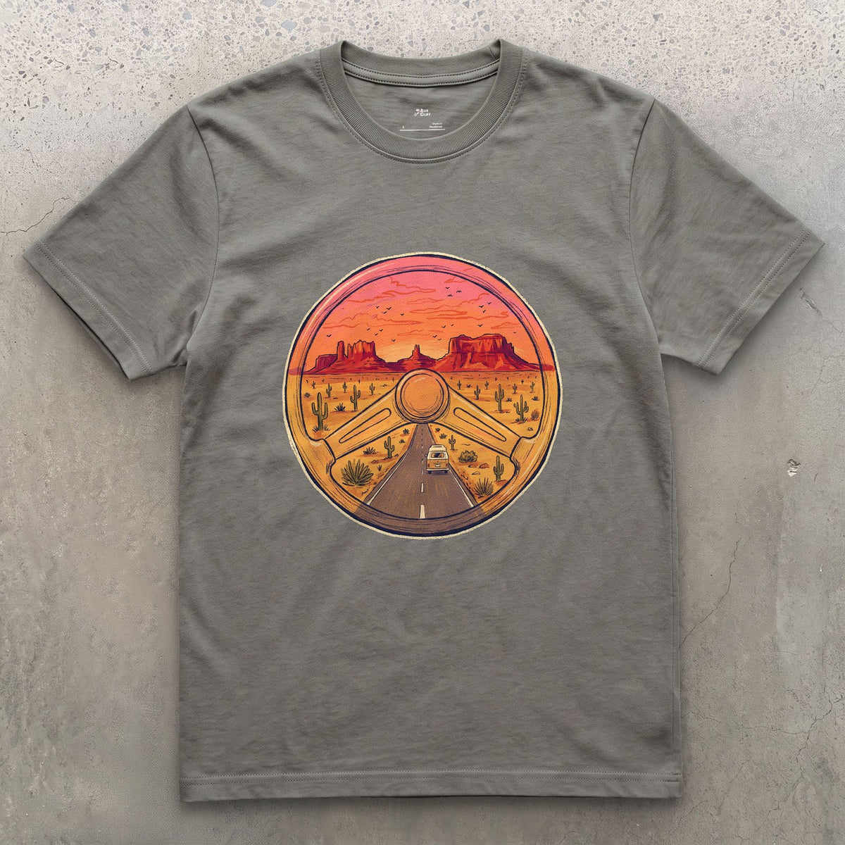 Desert Highway Behind the Wheel design on a Charcoal Gildan Softstyle t-shirt