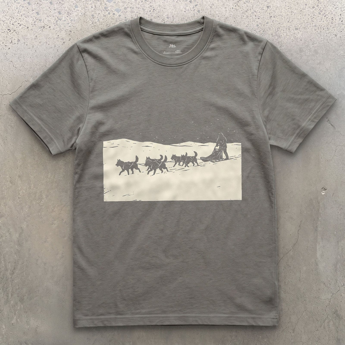 Dog Sled Team Running in Formation design on a Charcoal Gildan Softstyle t-shirt