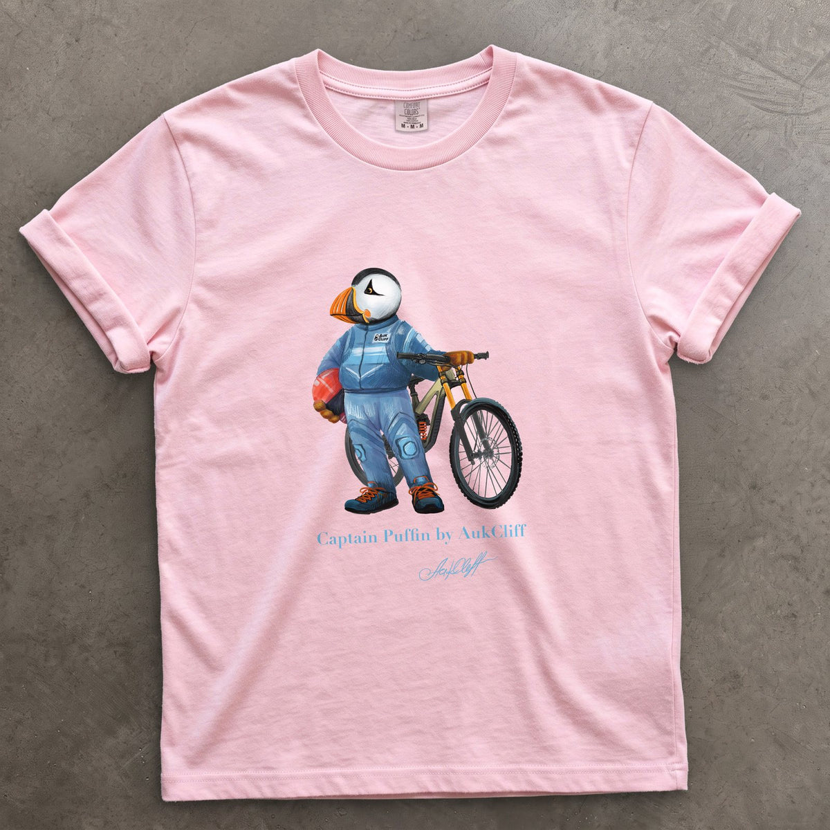Captain Puffin Downhill Mountain Biker on a Blossom Comfort Colors t-shirt