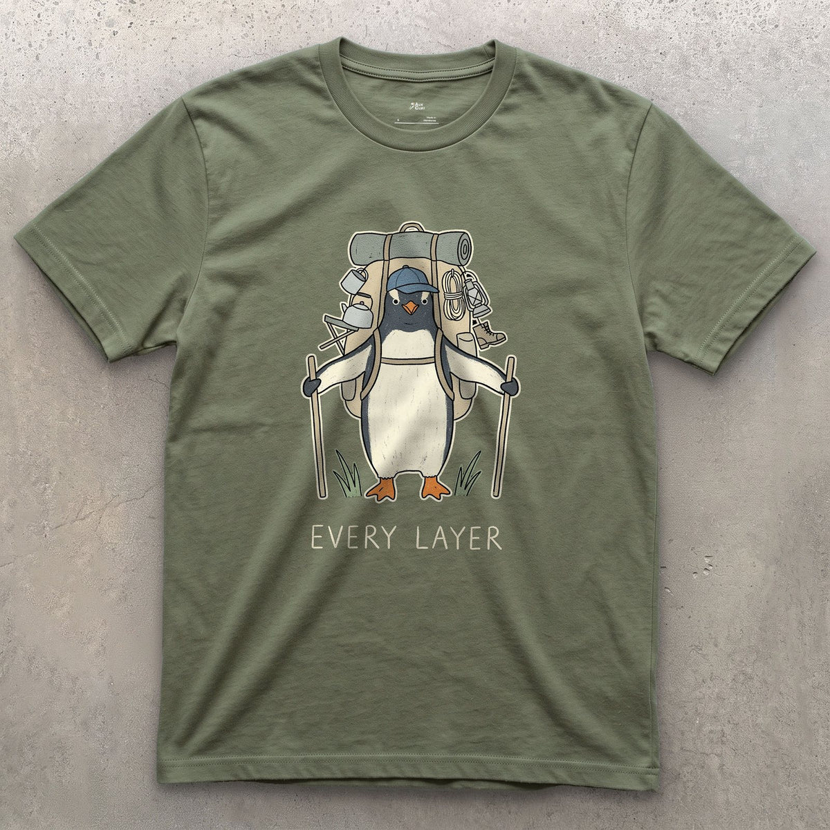 Doesn't Trust the Forecast, Penguin Hiker design on a Military Green Gildan Softstyle t-shirt