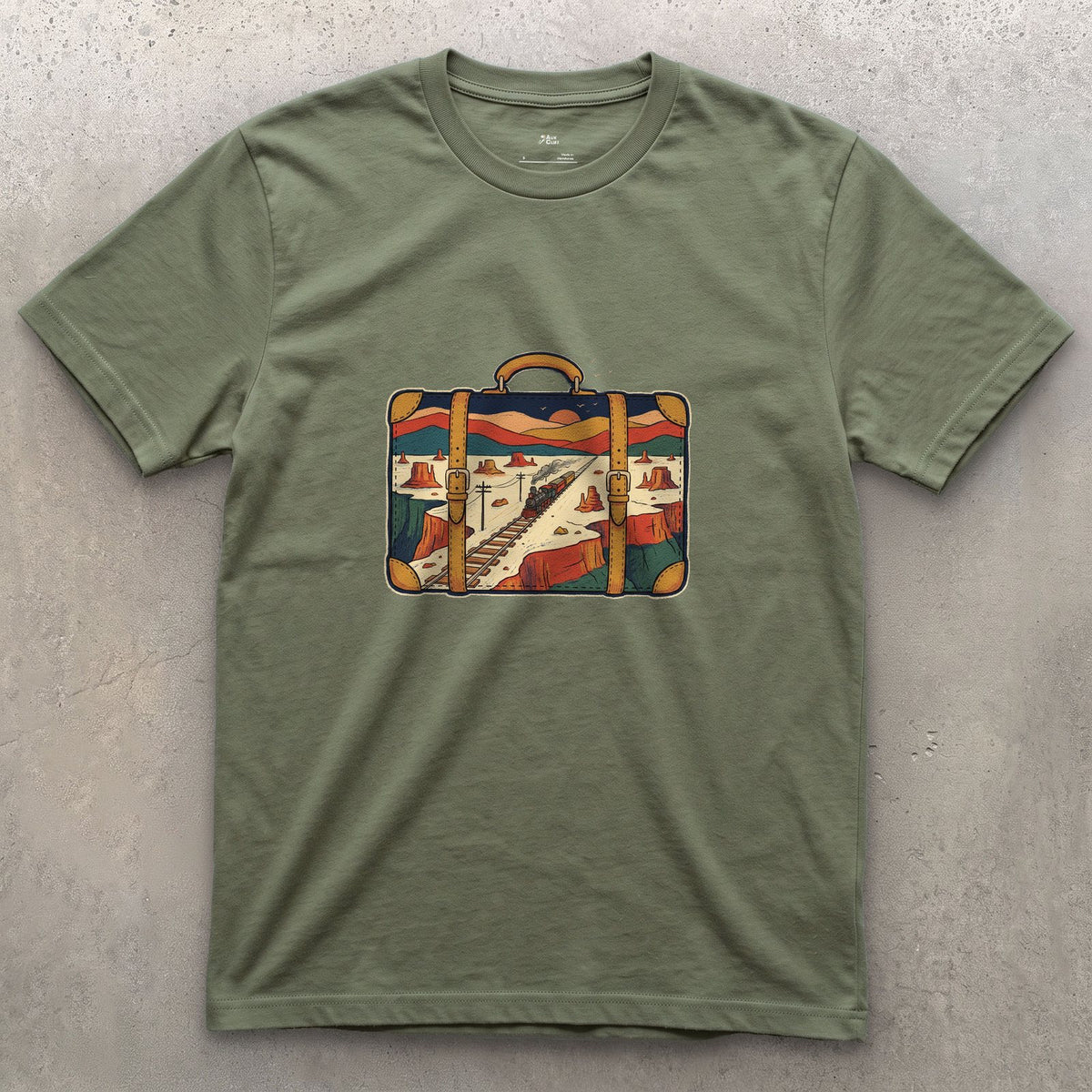 Everywhere It Has Been, Leather Suitcase design on a Military Green Gildan Softstyle t-shirt