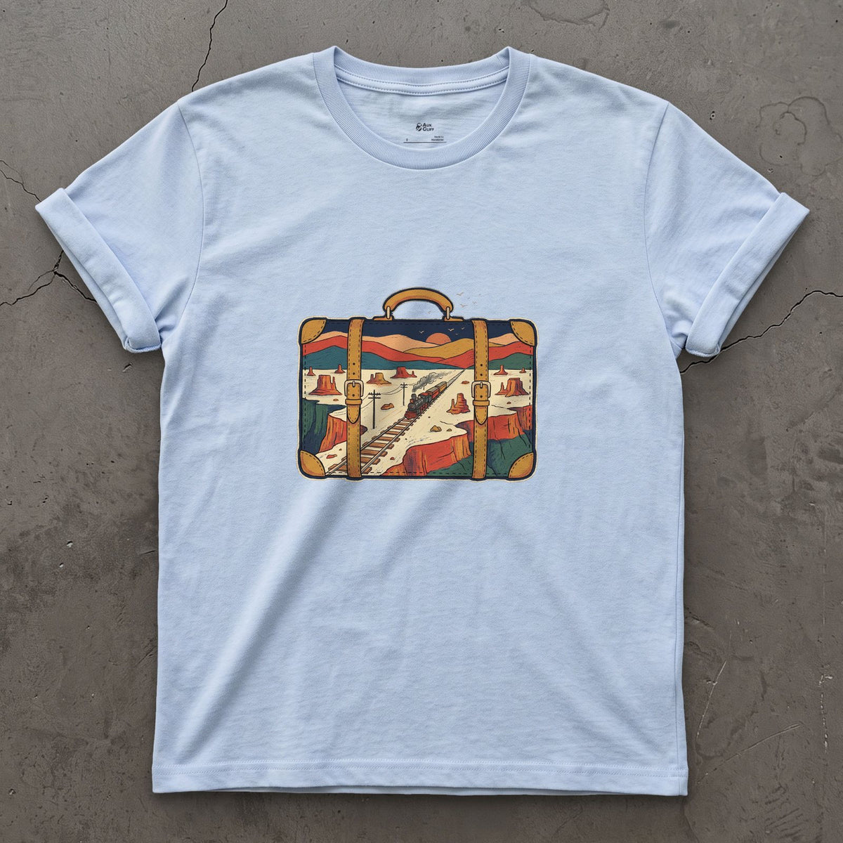 Everywhere It Has Been, Leather Suitcase design on a Light Blue Gildan Softstyle t-shirt