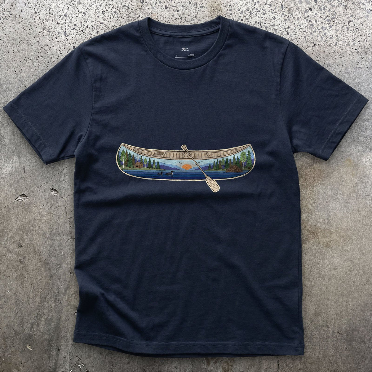 Forest Lake at Dusk, Open Canoe design on a Navy Gildan Softstyle t-shirt
