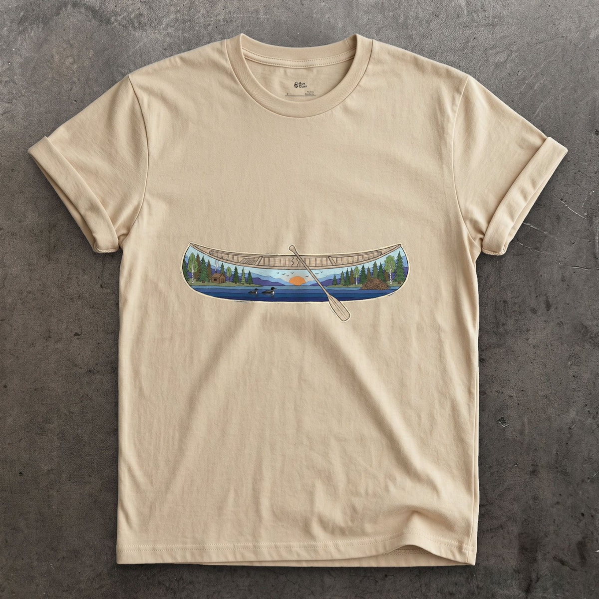 Forest Lake at Dusk, Open Canoe design on a Sand Gildan Softstyle t-shirt