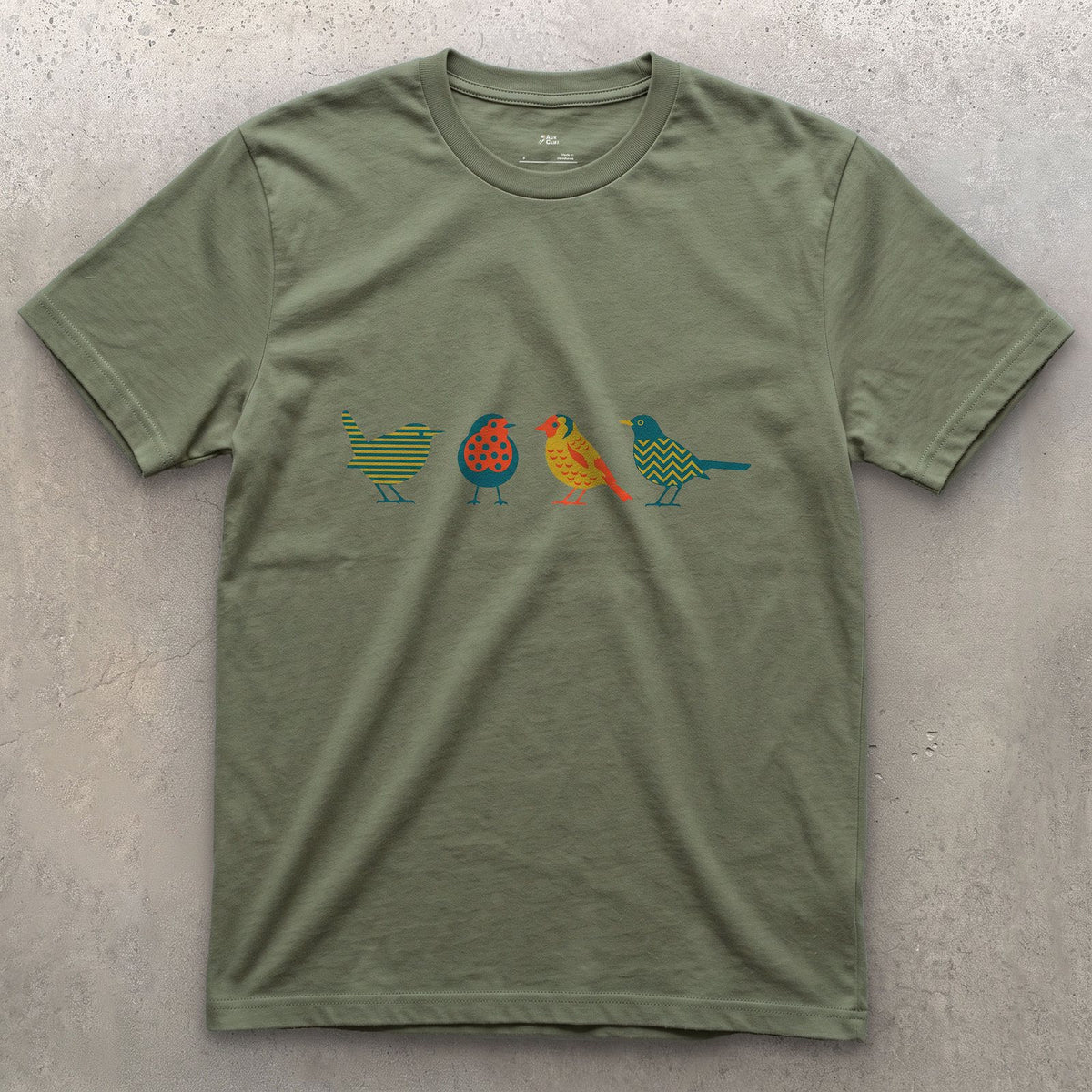 Four Birds in a Row, Each in Its Own Pattern design on a Military Green Gildan Softstyle t-shirt