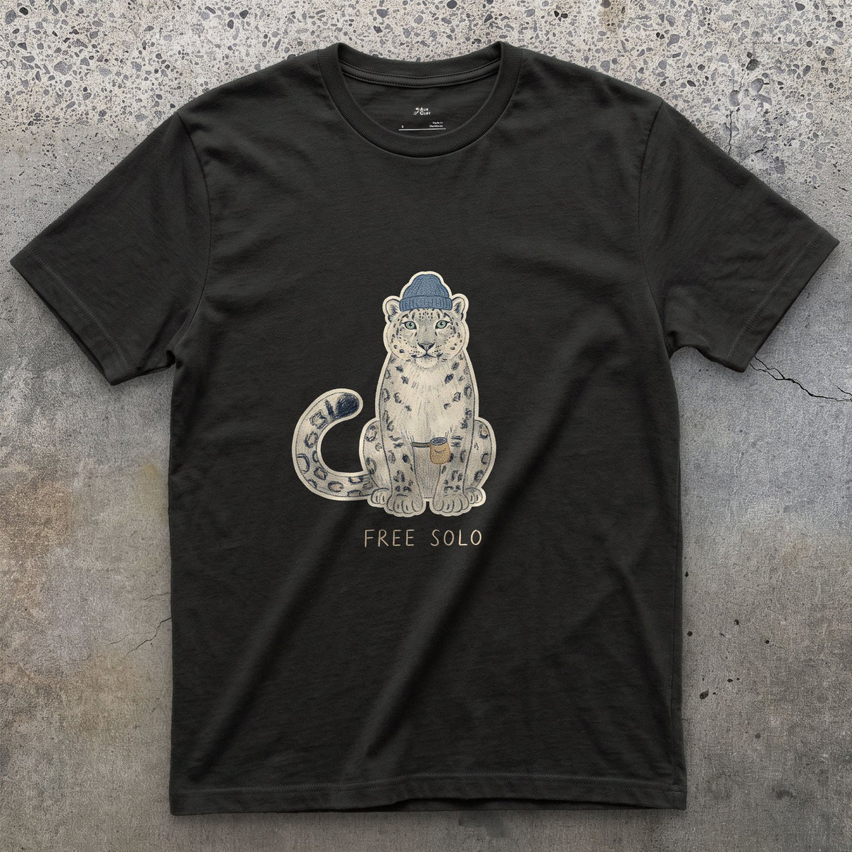 Free Solo Climber, Snow Leopard in a Beanie design on a Black Gildan Softstyle t-shirt