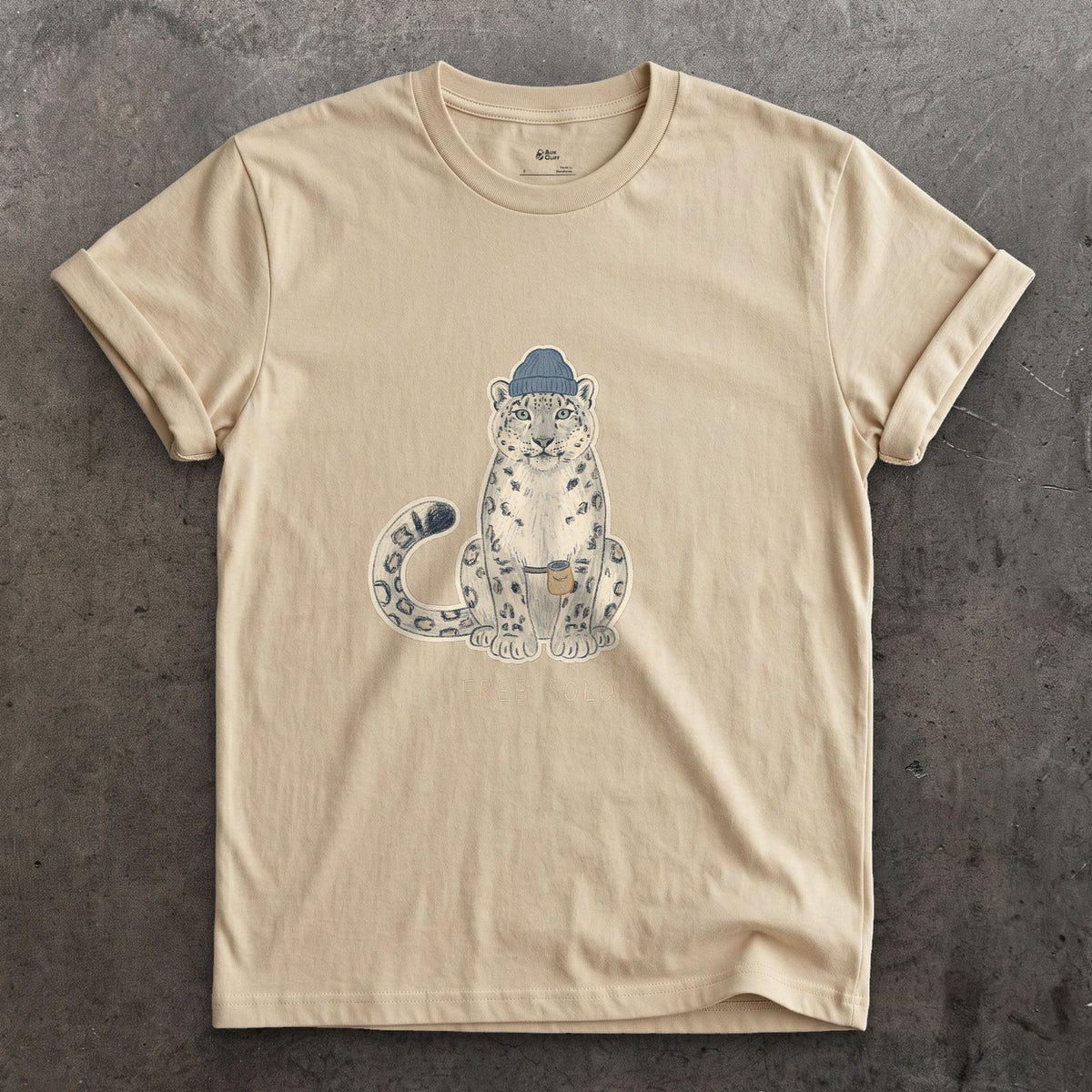 Free Solo Climber, Snow Leopard in a Beanie design on a Sand Gildan Softstyle t-shirt
