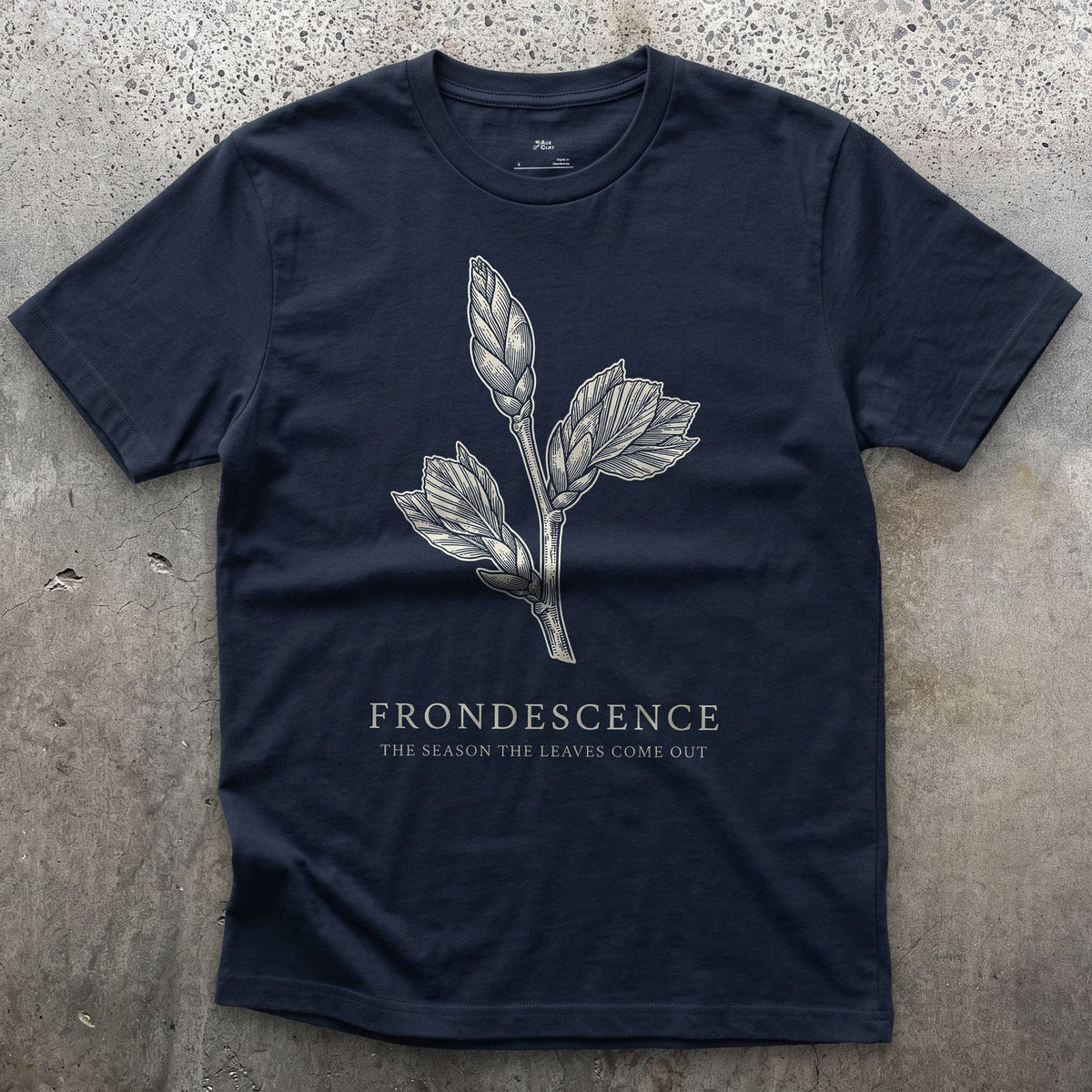 Frondescence design on a Navy Gildan Softstyle t-shirt