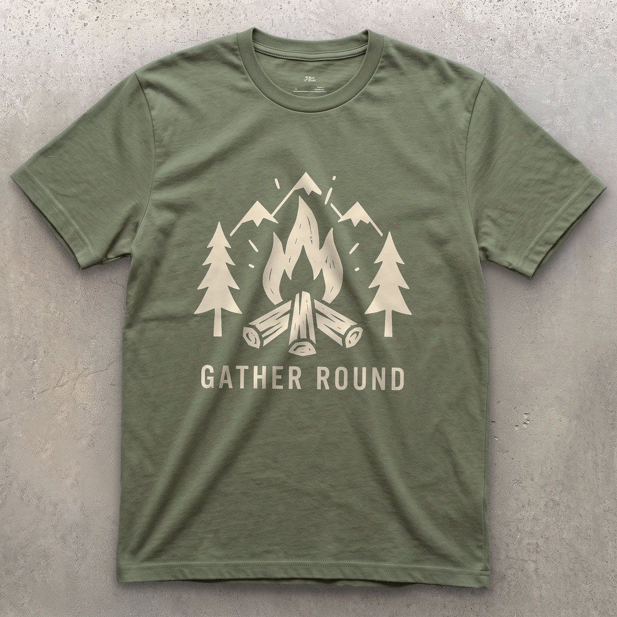 Gather Round, Mountains and Firewood design on a Military Green Gildan Softstyle t-shirt