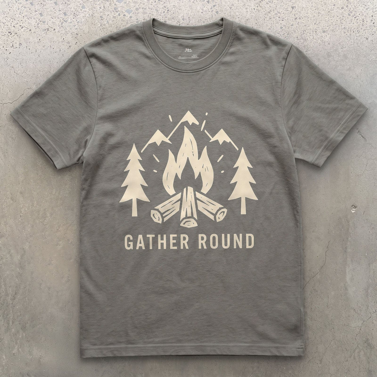 Gather Round, Mountains and Firewood design on a Charcoal Gildan Softstyle t-shirt