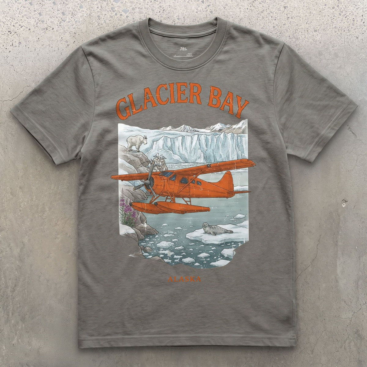 Glacier Bay Bush Plane design on a Charcoal Gildan Softstyle t-shirt