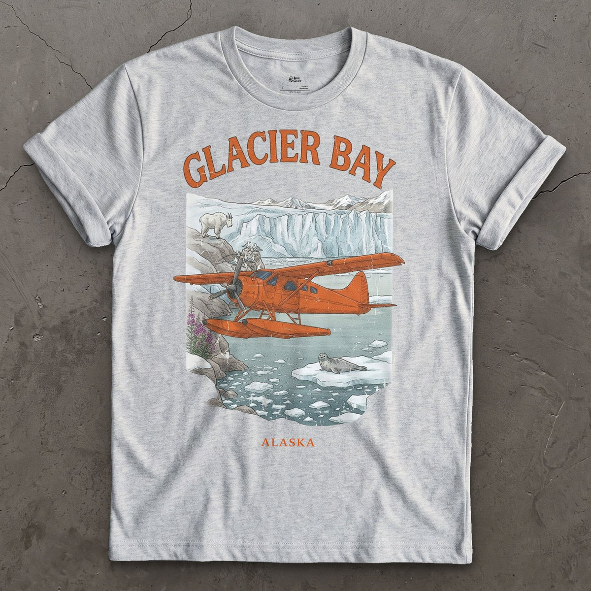 Glacier Bay Bush Plane design on a Sport Grey Gildan Softstyle t-shirt