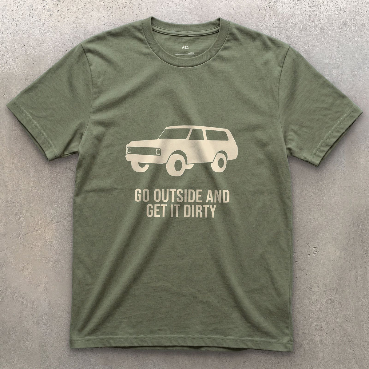 Go Outside and Get It Dirty, Boxy Wagon design on a Military Green Gildan Softstyle t-shirt