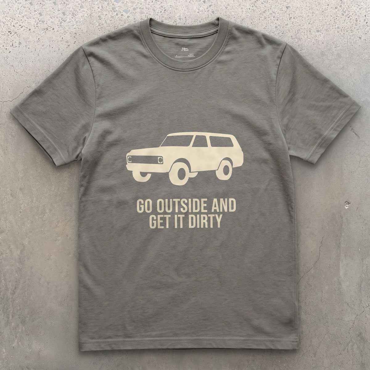 Go Outside and Get It Dirty, Boxy Wagon design on a Charcoal Gildan Softstyle t-shirt