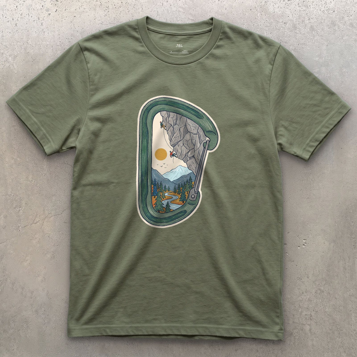 Granite Wall Through a Carabiner design on a Military Green Gildan Softstyle t-shirt