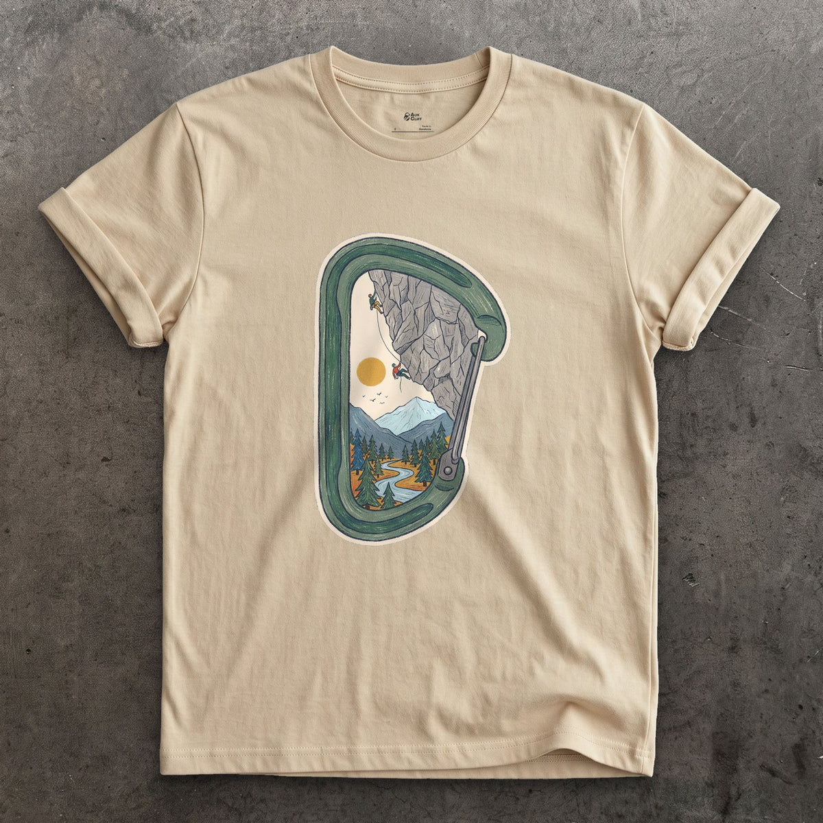 Granite Wall Through a Carabiner design on a Sand Gildan Softstyle t-shirt