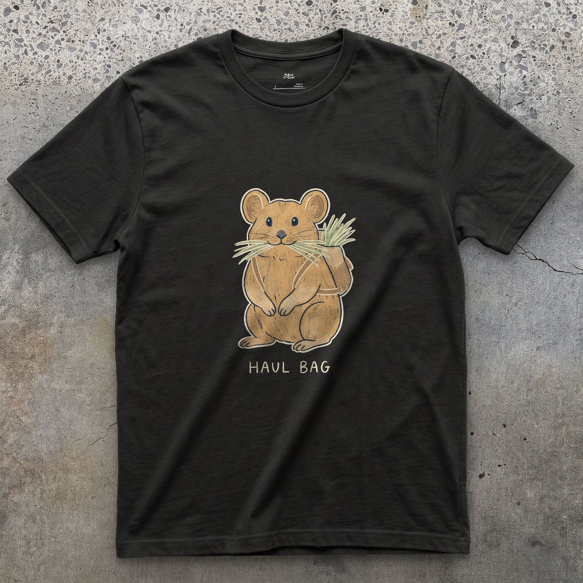 Big Wall Haul Bag, Pika Hauling Hay design on a Black Gildan Softstyle t-shirt