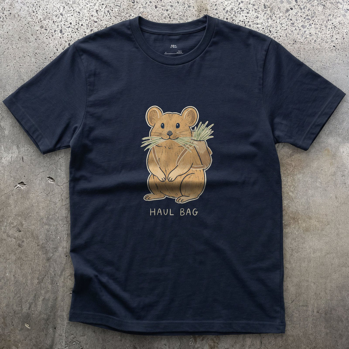 Big Wall Haul Bag, Pika Hauling Hay design on a Navy Gildan Softstyle t-shirt
