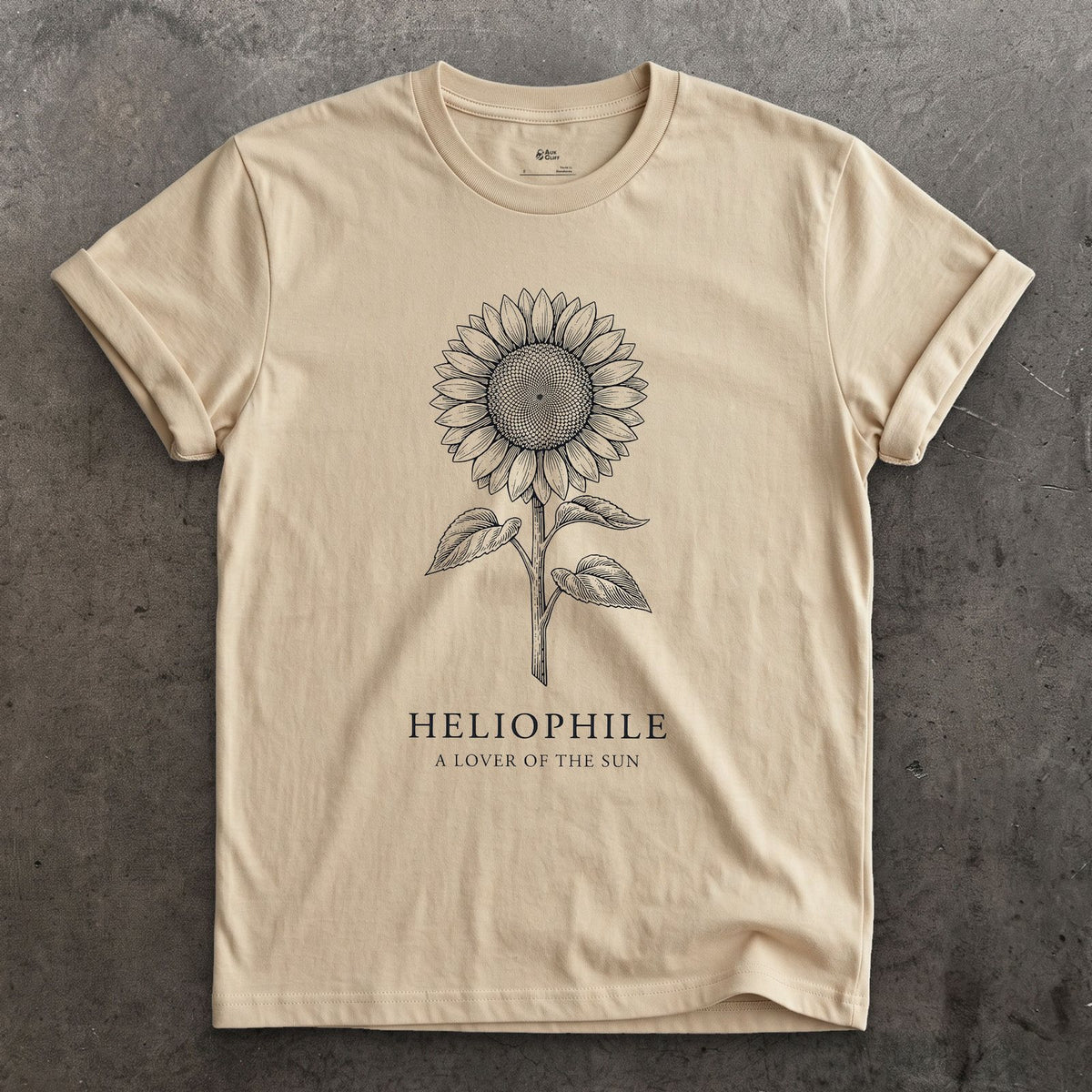 Heliophile design on a Sand Gildan Softstyle t-shirt