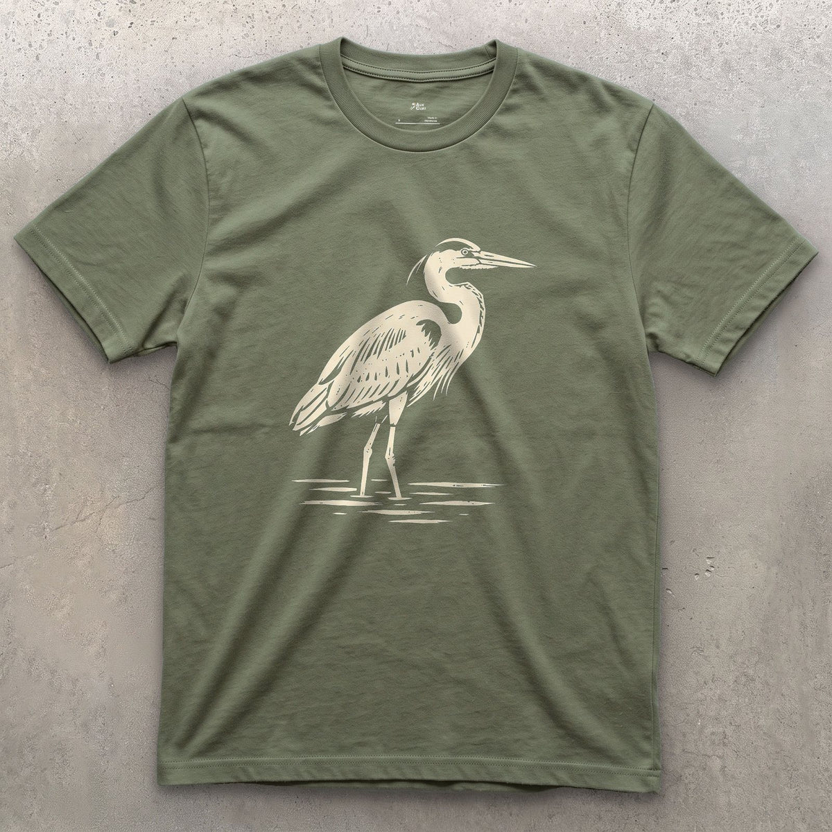 Waiting Longer Than You Will, Heron design on a Military Green Gildan Softstyle t-shirt