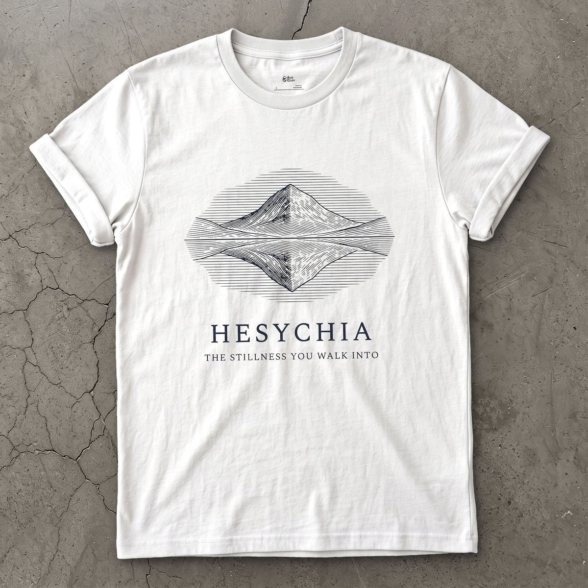 Hesychia, the Stillness You Walk Into design on a White Gildan Softstyle t-shirt