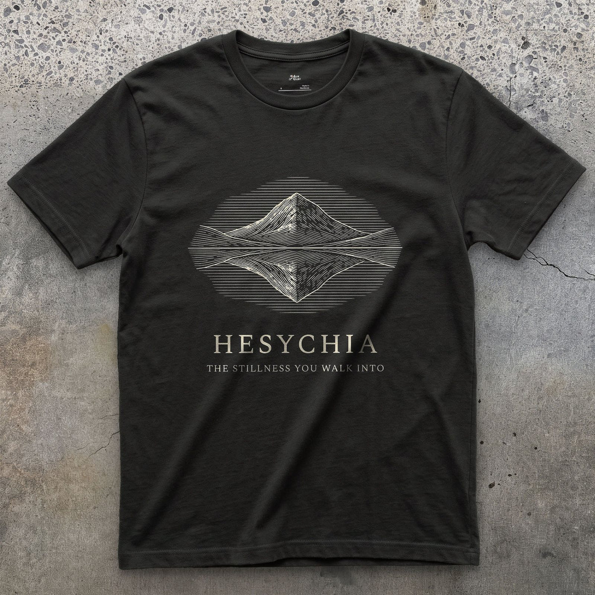 Hesychia, the Stillness You Walk Into design on a Black Gildan Softstyle t-shirt