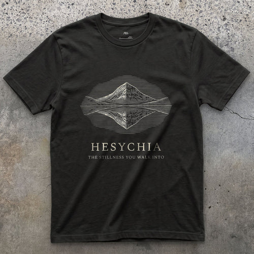 Hesychia, the Stillness You Walk Into design on a Black Gildan Softstyle t-shirt