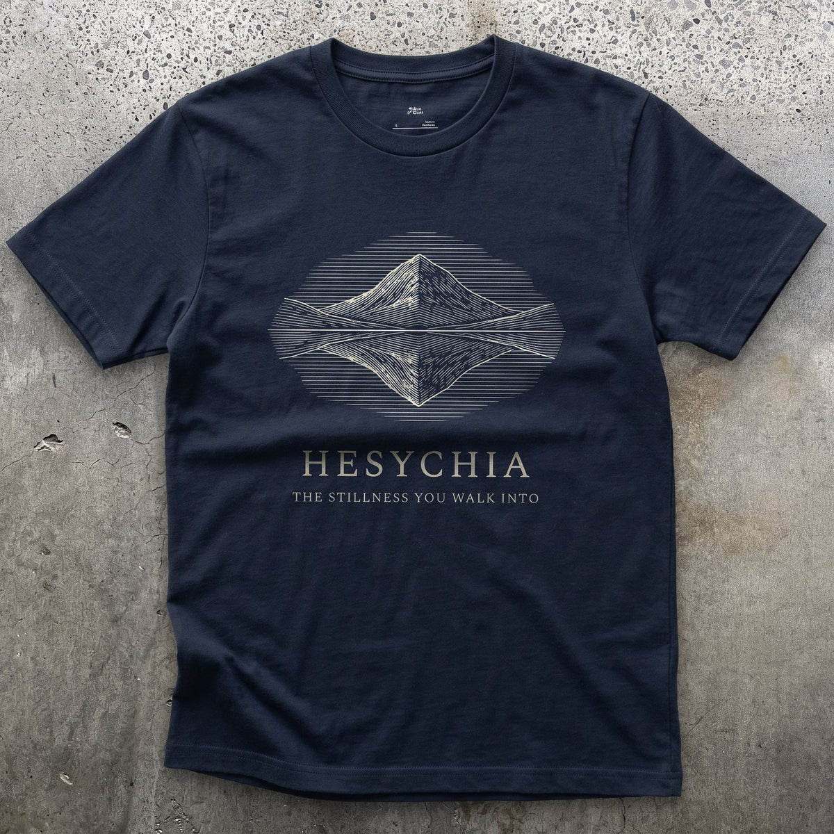 Hesychia, the Stillness You Walk Into design on a Navy Gildan Softstyle t-shirt