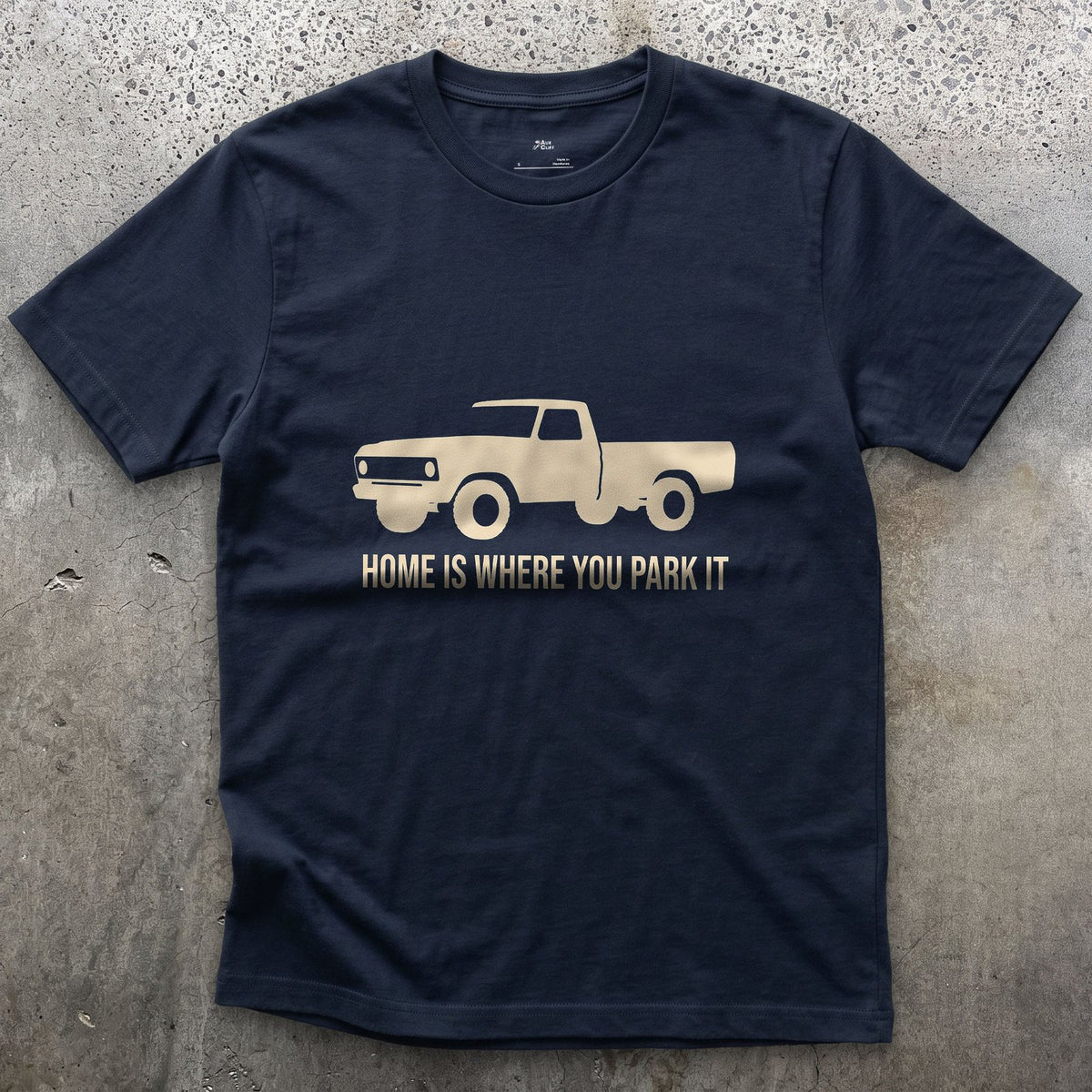 Home Is Where You Park It, Truck and Tent design on a Navy Gildan Softstyle t-shirt
