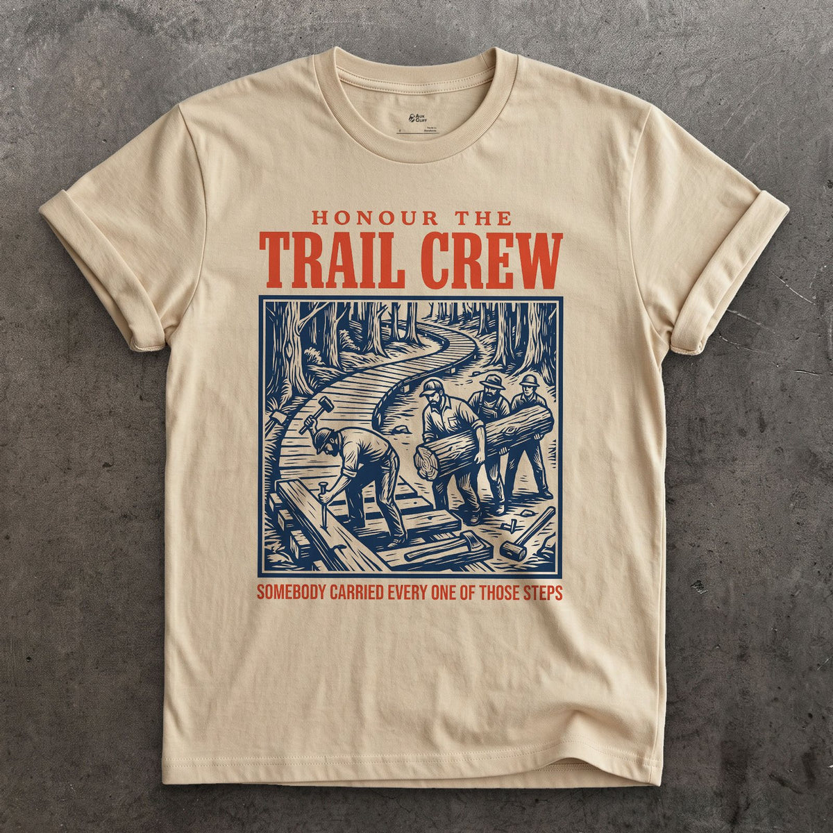 Honour the Trail Crew, Every Step Was Carried design on a Sand Gildan Softstyle t-shirt