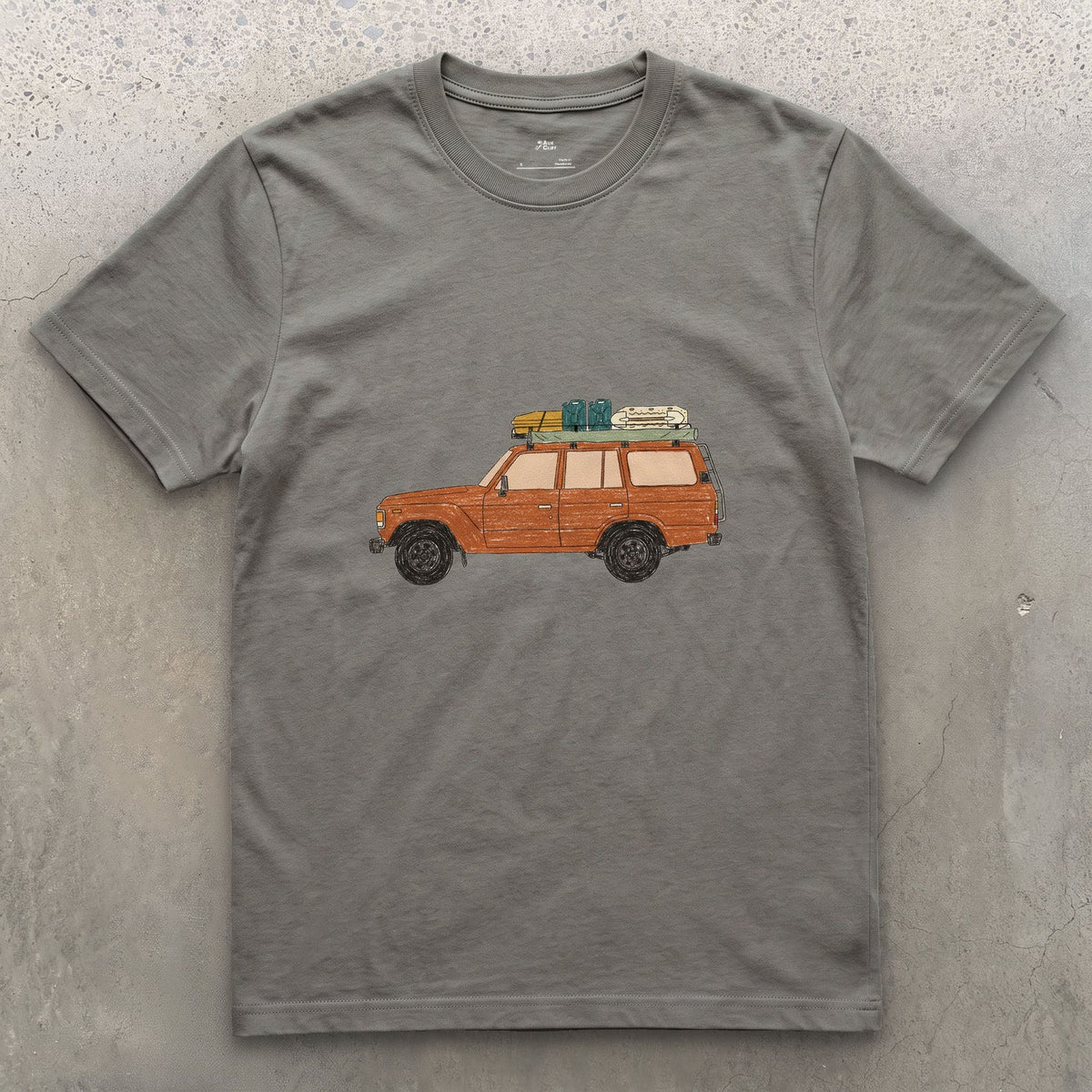 Bags and a Cooler Loaded on the Roof Rack design on a Charcoal Gildan Softstyle t-shirt